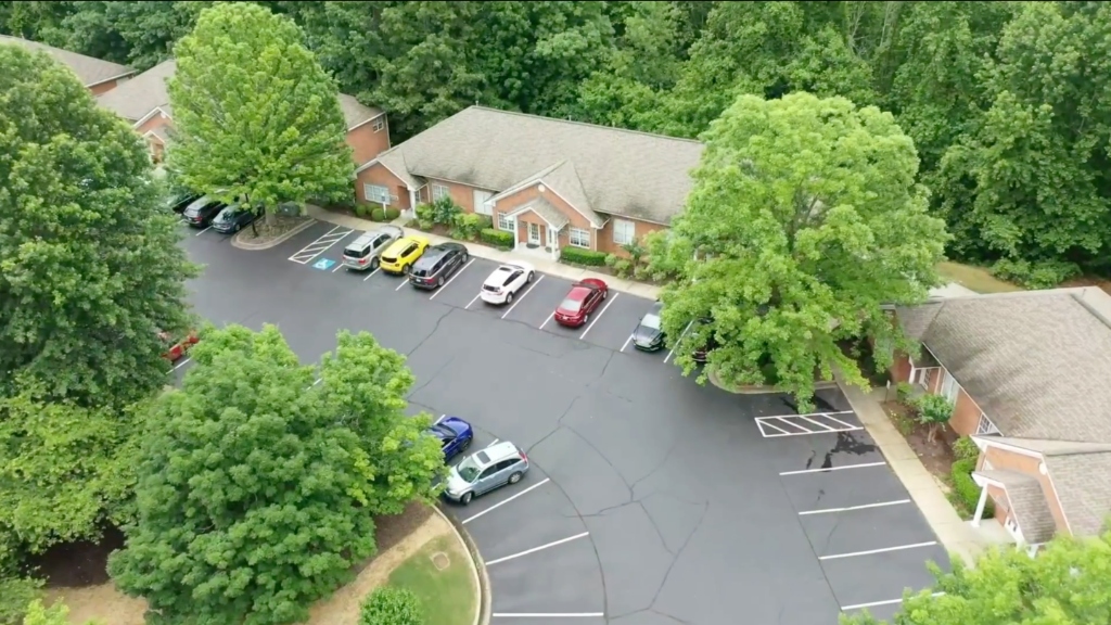 Aerial close-up of the Premier Executive Suites building at Creekstone Ridge, Woodstock GA — the professional commercial business center providing virtual office addresses at 225 Creekstone Ridge, Woodstock GA 30188 for LLC registration, U.S. bank account opening, and mail handling