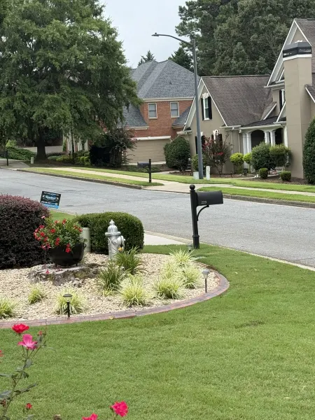 Subterranean stump grinding within landscape bed in Canton GA