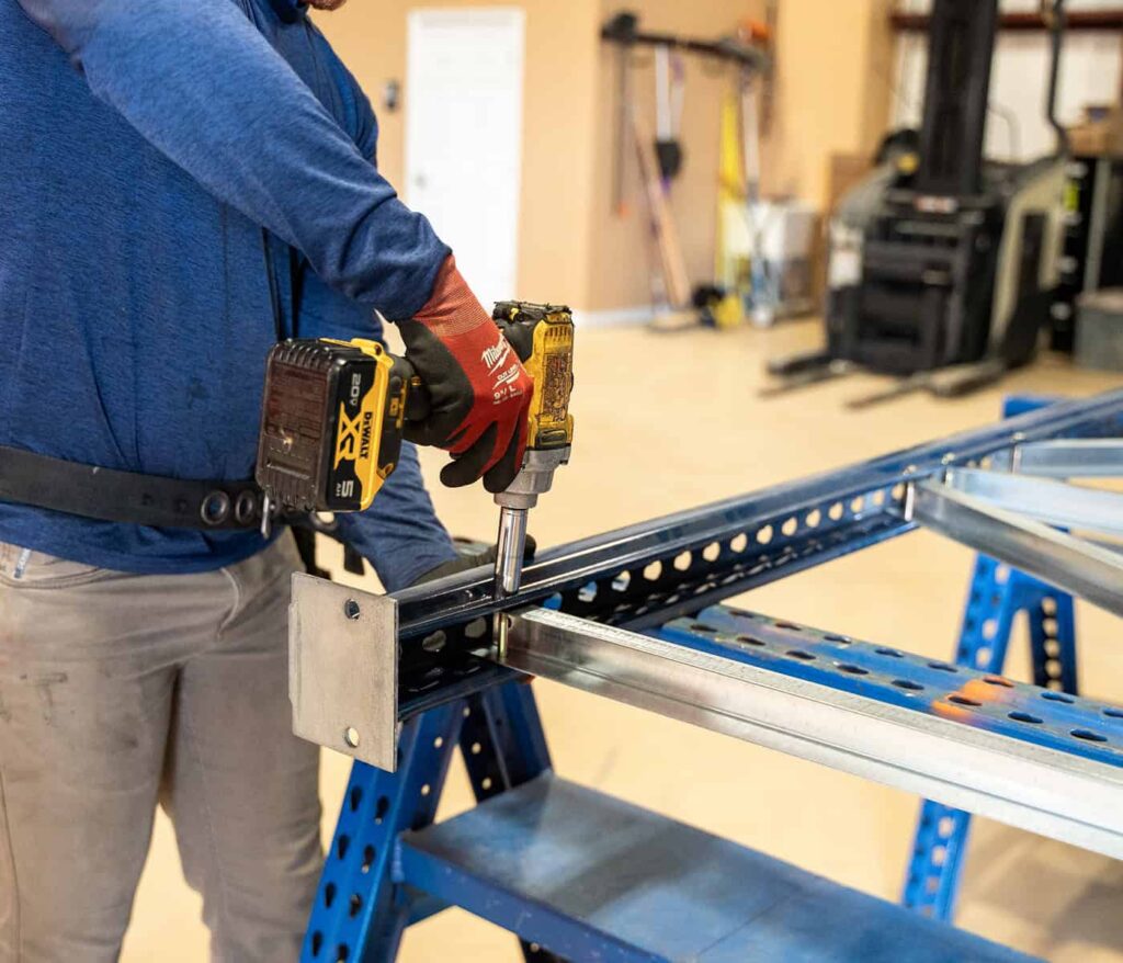 Atlanta Warehouse Solutions team building pallet racking — Ball Ground GA